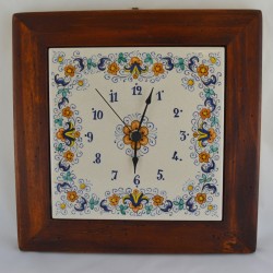 CLOCK “VOLUTE FIORI” WITH WOODEN FRAM WORM-EATEN FROM CM. 28,5