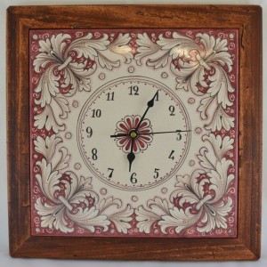 OROLOGIO “GIRALI FIORITI” CON CORNICE TARLATA  DA CM. 37