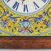 OROLOGIO “VOLUTE BLU FONDO GIALLO” CON CORNICE TARLATA  DA CM. 34